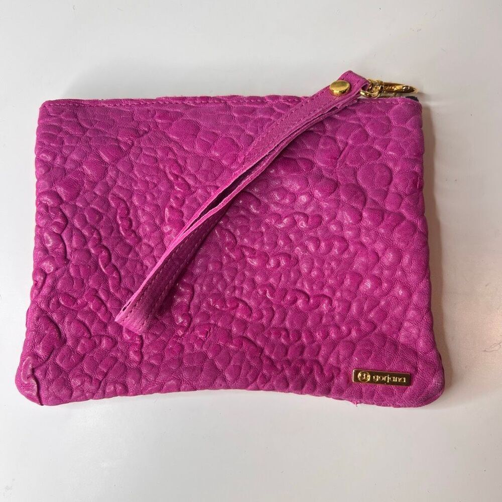 Gorjana fuchsia pink leather clutch features a textured, pebble-like finish and